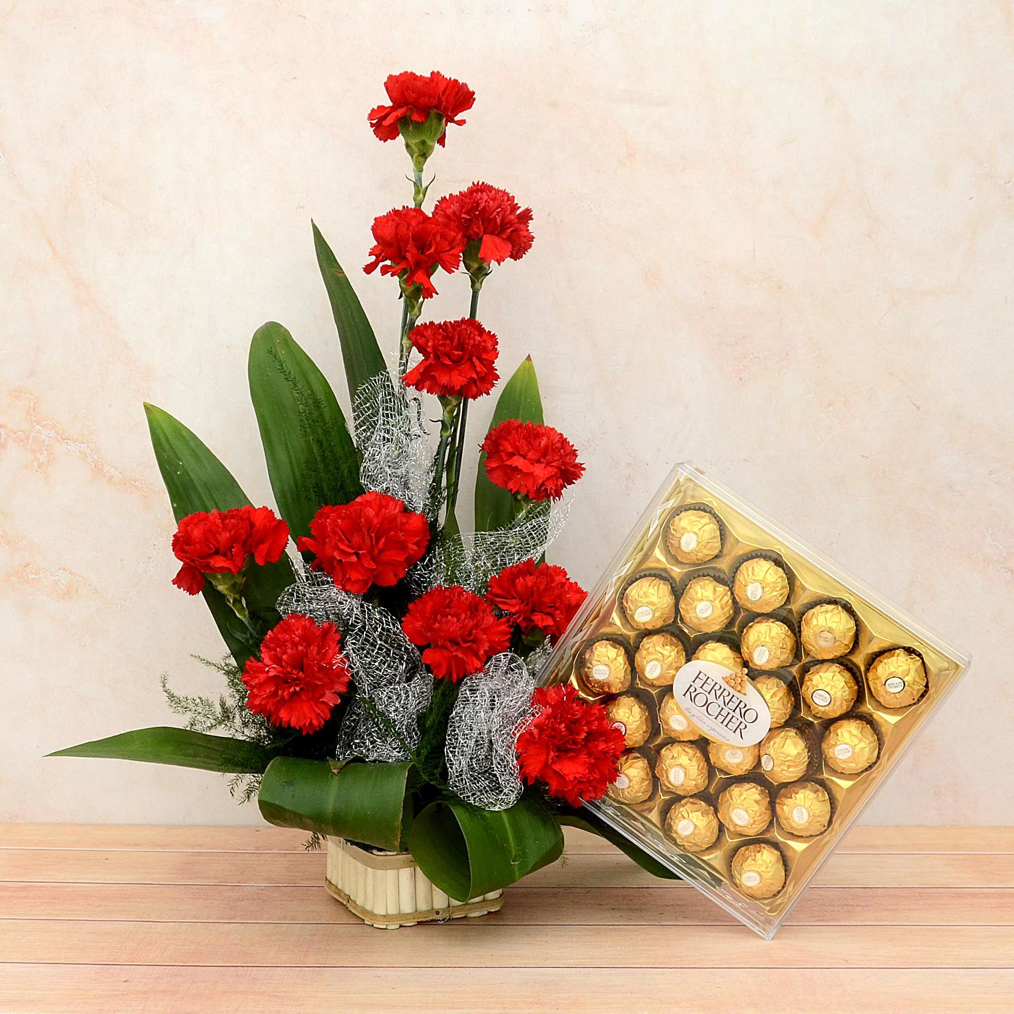 Red Carnations and Rocher