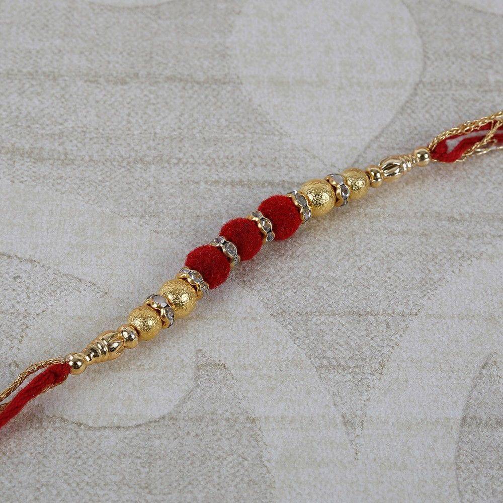 Gold And Red Velvet Beads Rakhi - YuvaFlowers